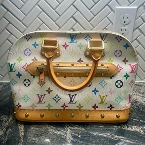 Pre-loved authentic Louis Vuitton Monogram Multicolor Alma PM